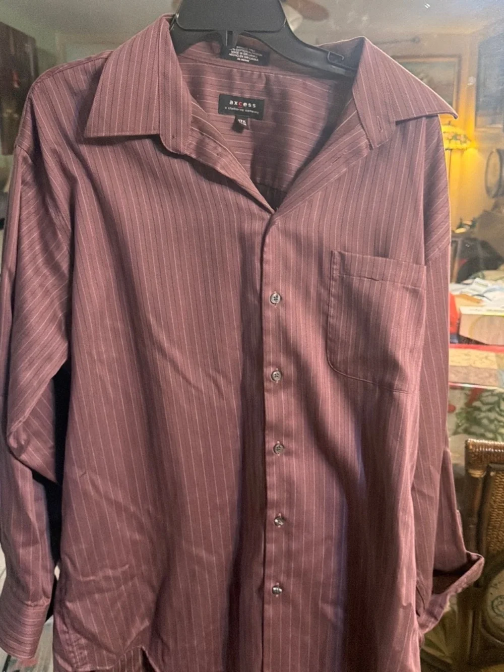 Axcess brand dress shirt, featuring a purple color with vertical stripes